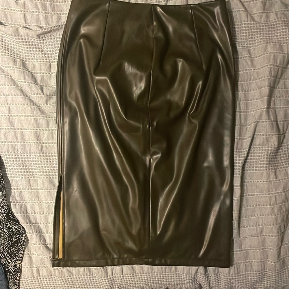 Pleather skirt definitely giving fall vibes! Can dress it up very nicely!